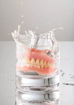 dentures in a glass